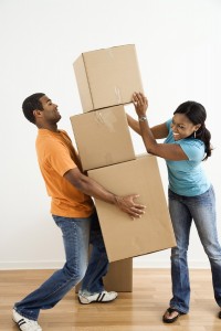 Couple with moving boxes.